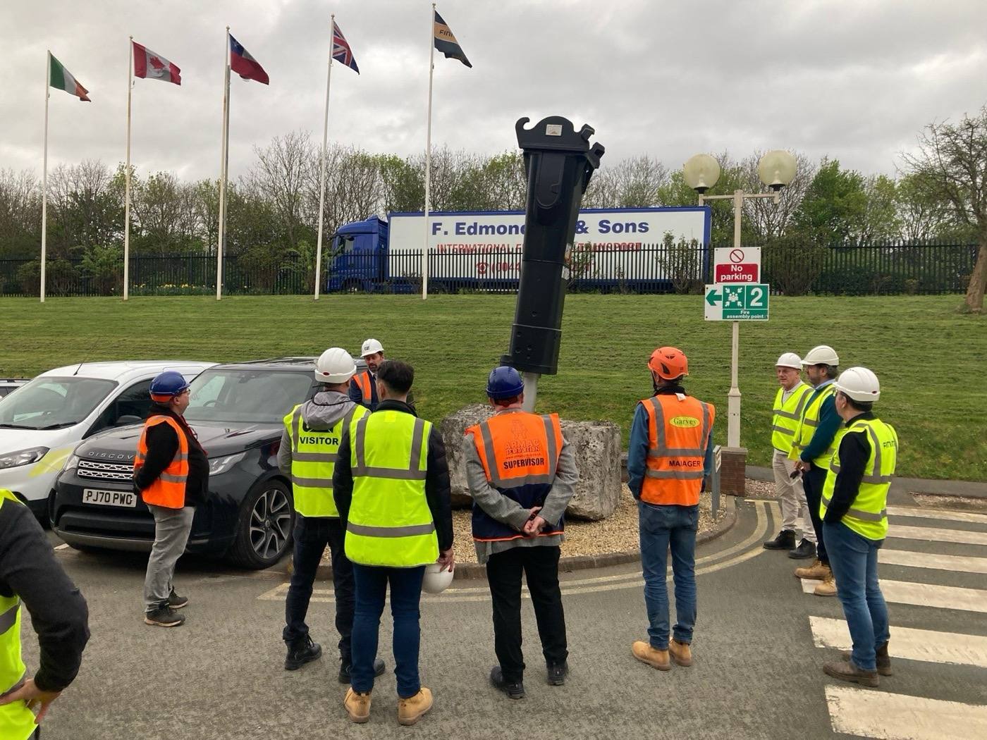 Members inspecting plant and attachments at a regional meeting